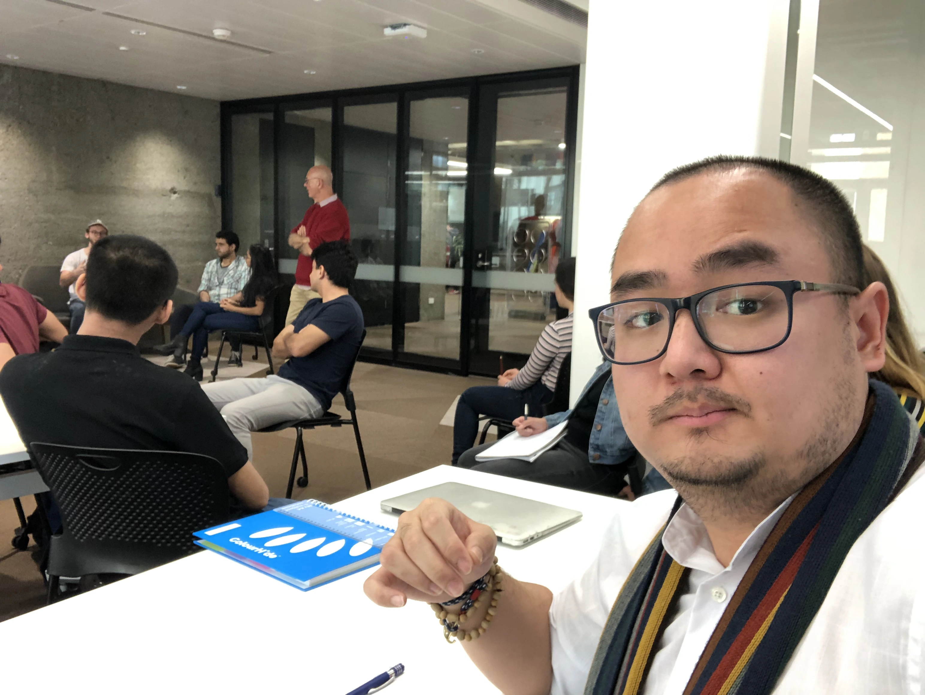 Students standing on a rope challenge